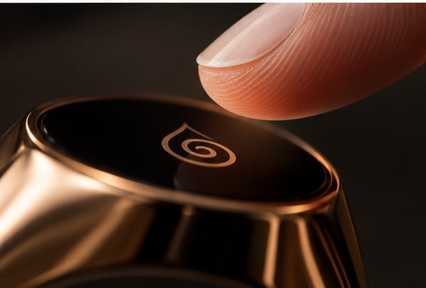 A fingertip hovering over Guardio's touch surface